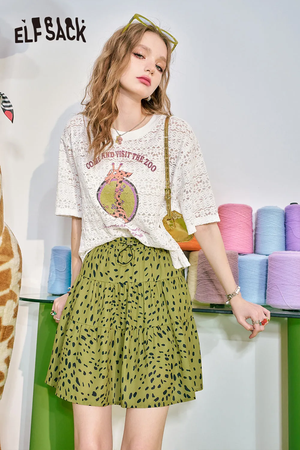 ELFSACK 2024 Summer New Leopard Pattern A-line Half Skirt Women's Elastic Waist Pig Nose Buckle Design Short Skirt
